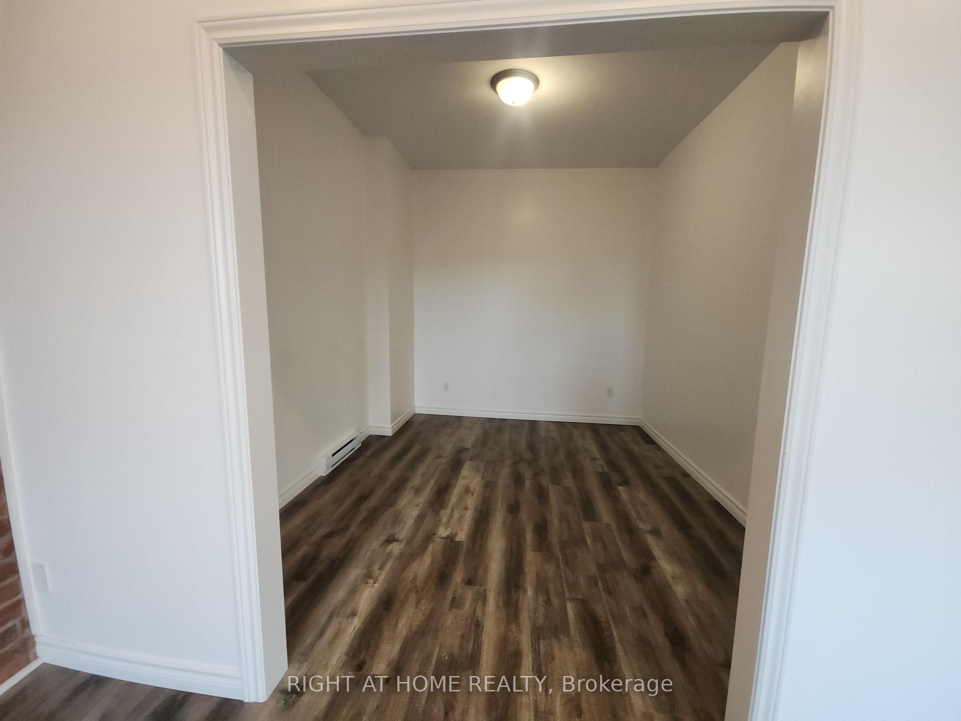 Photo 3 of Unit 202, 9 Queen Street W, Springwater, Elmvale — HOMEH