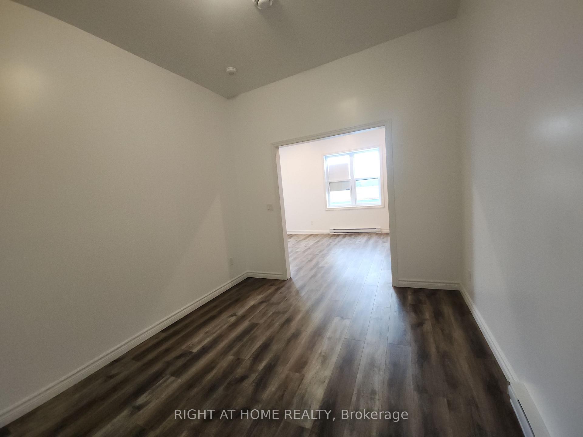 Photo 4 of Unit 202, 9 Queen Street W, Springwater, Elmvale — HOMEH