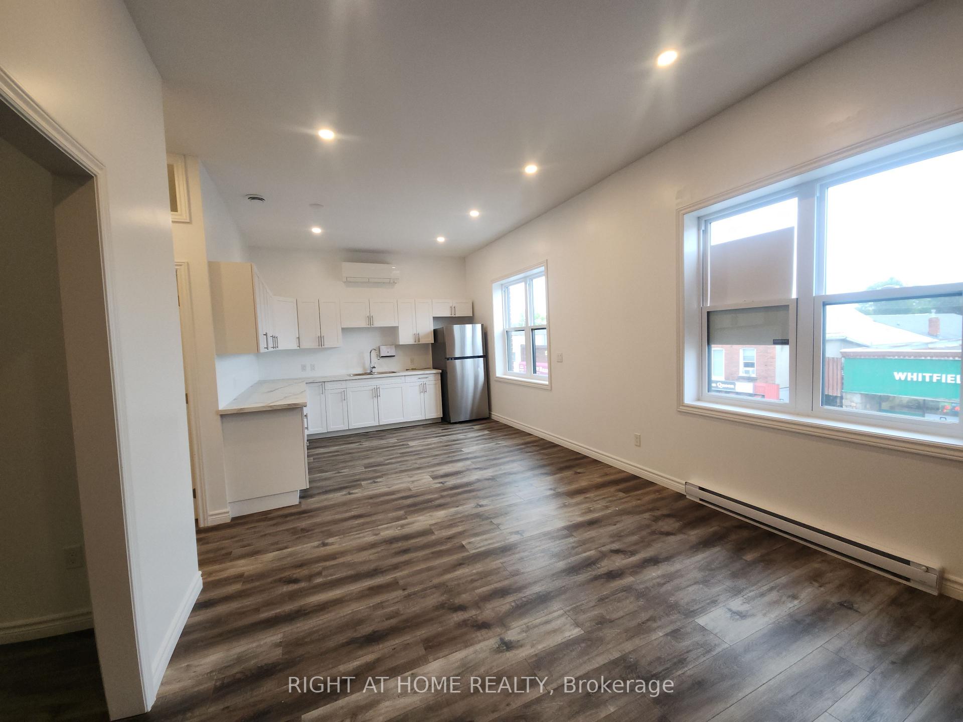 Photo 5 of Unit 202, 9 Queen Street W, Springwater, Elmvale — HOMEH