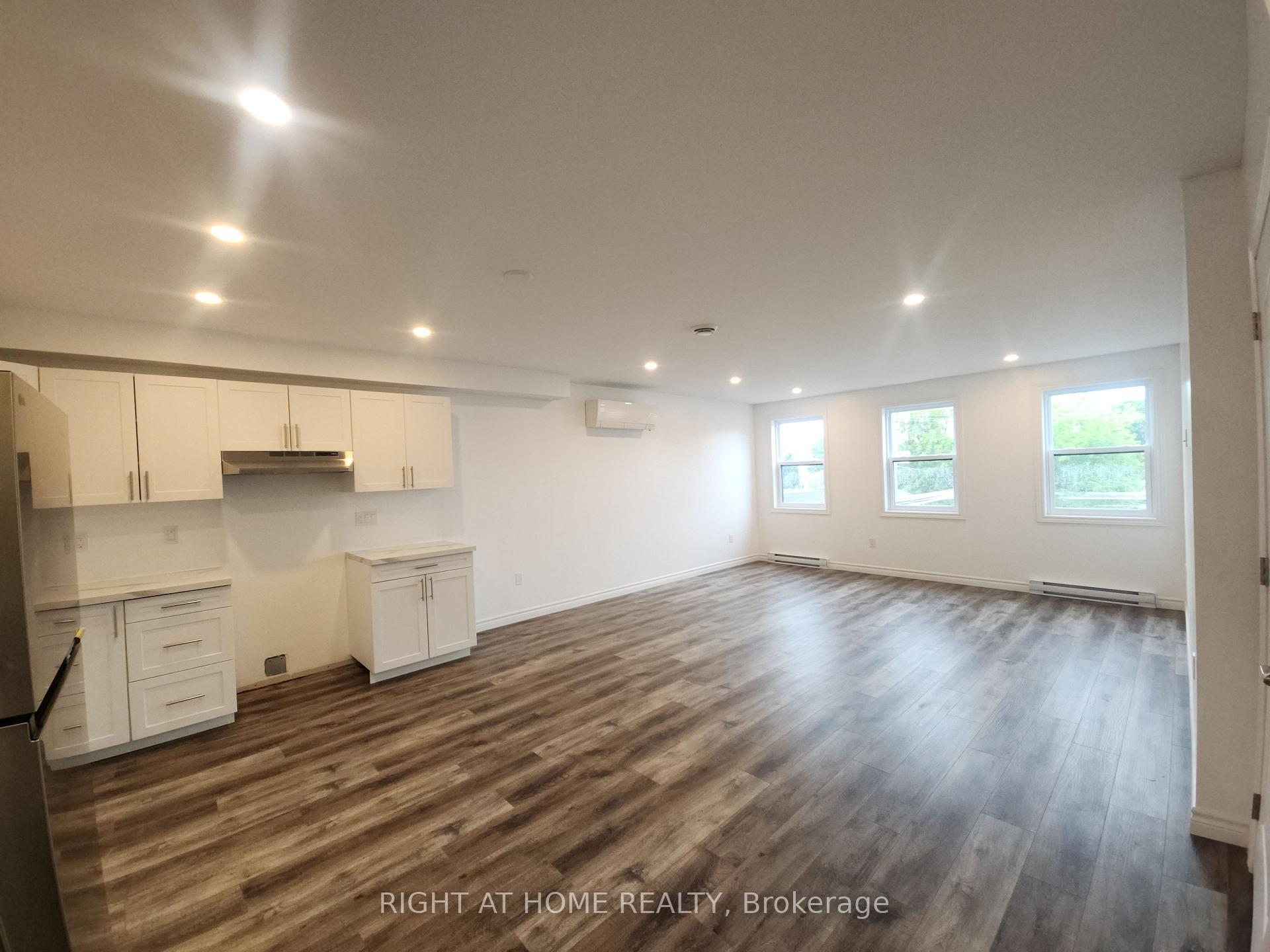 Photo 10 of Unit 202, 9 Queen Street W, Springwater, Elmvale — HOMEH