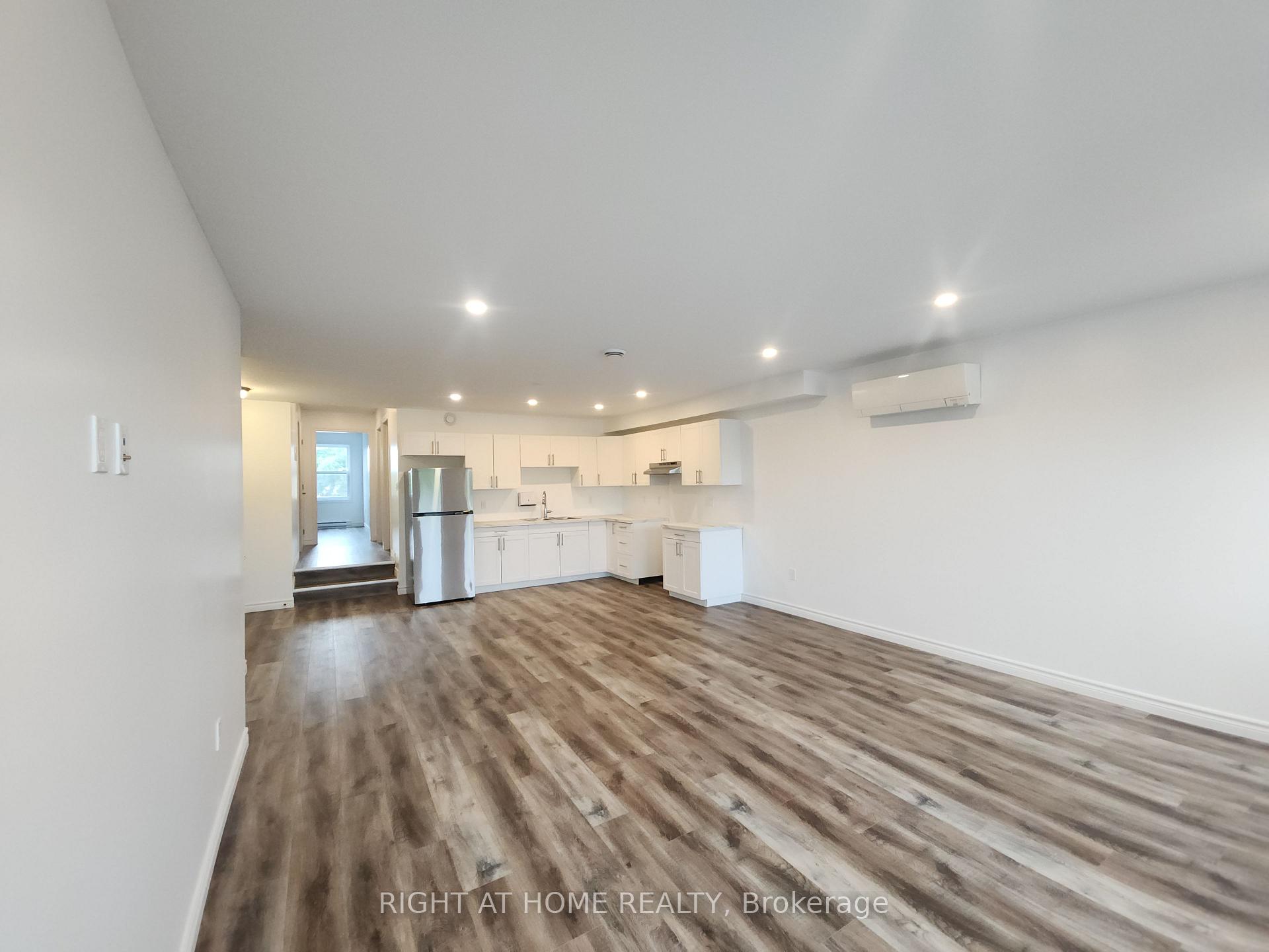 Photo 11 of Unit 202, 9 Queen Street W, Springwater, Elmvale — HOMEH
