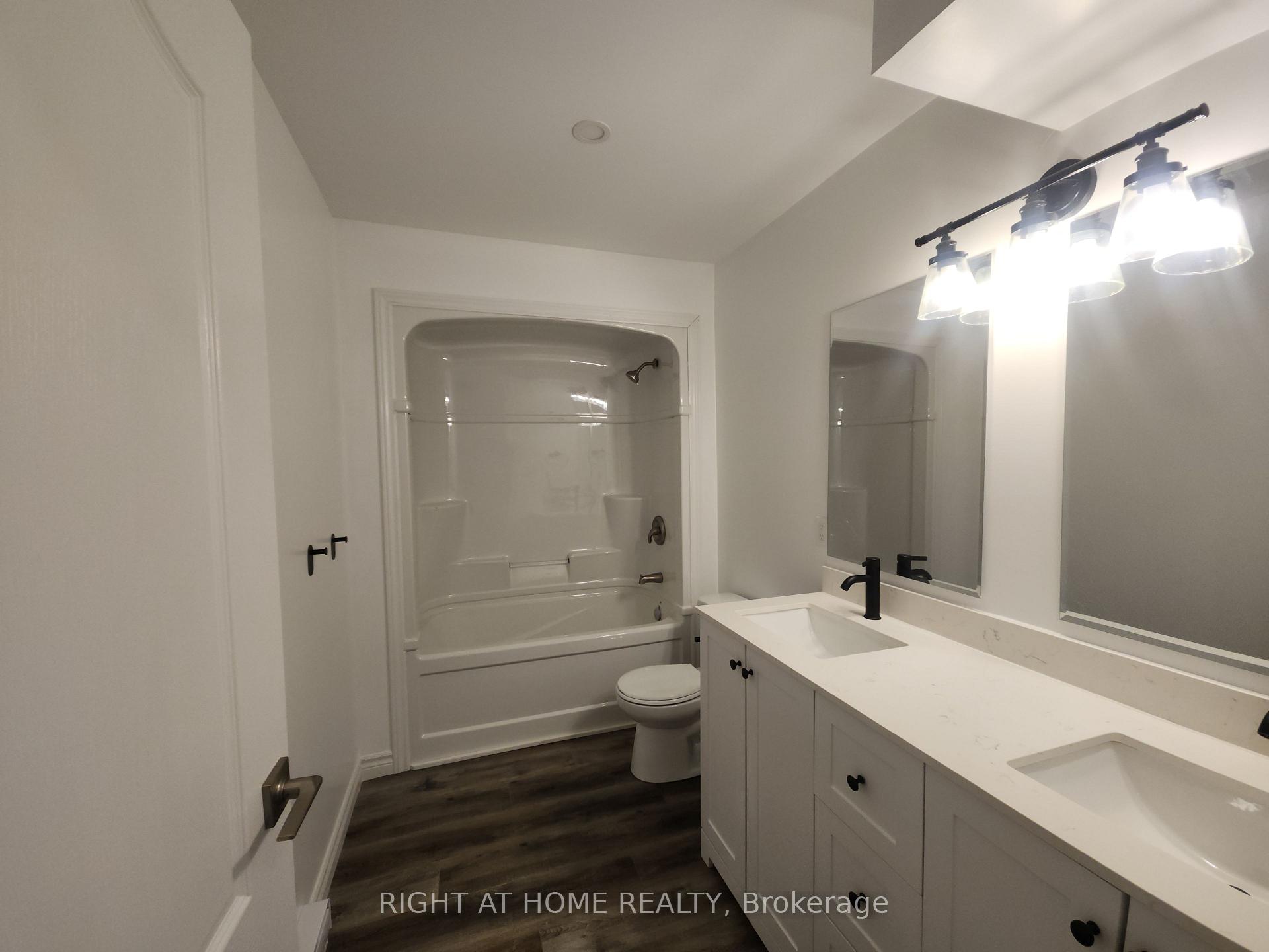 Photo 16 of Unit 202, 9 Queen Street W, Springwater, Elmvale — HOMEH