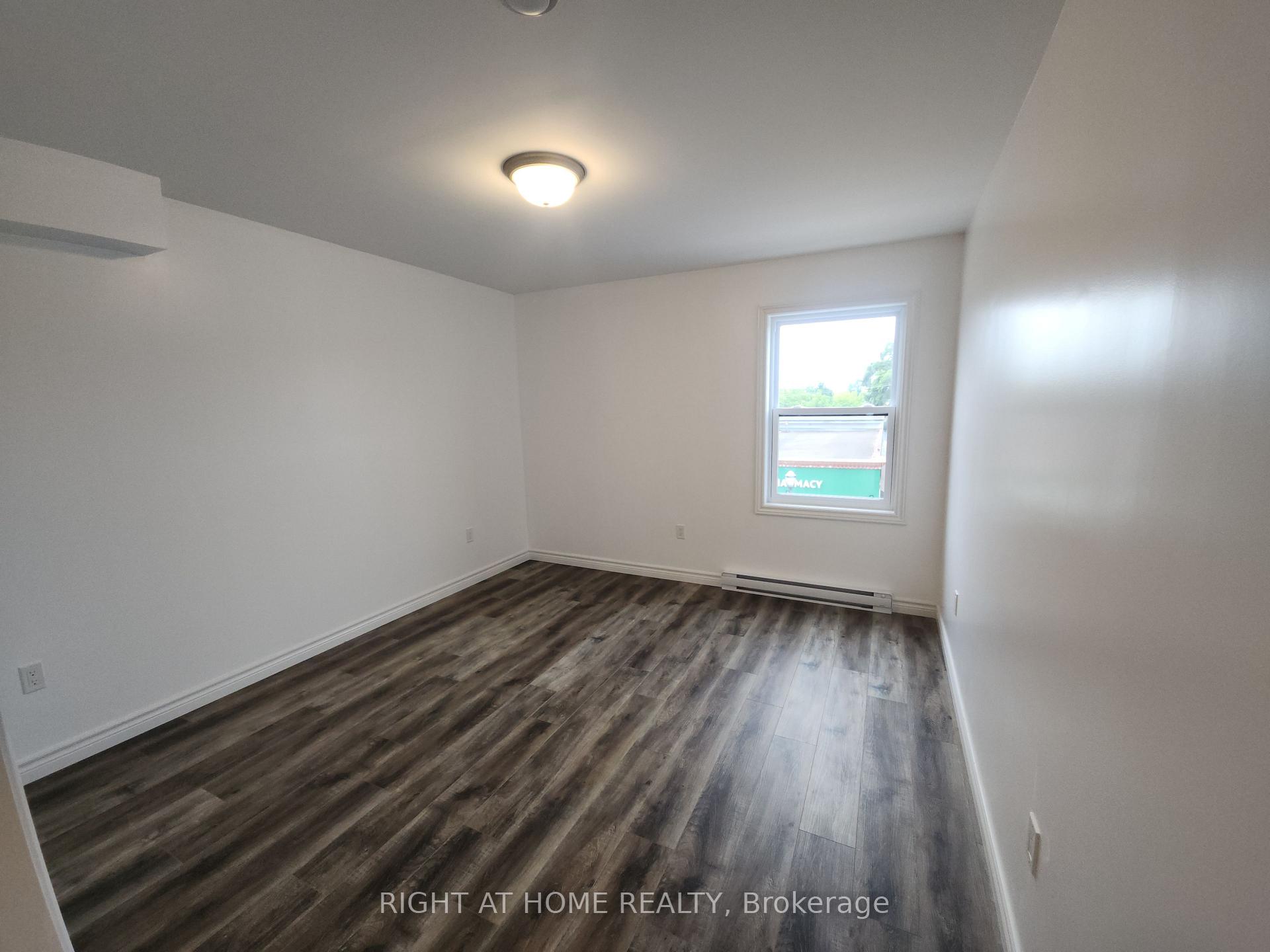 Photo 19 of Unit 202, 9 Queen Street W, Springwater, Elmvale — HOMEH