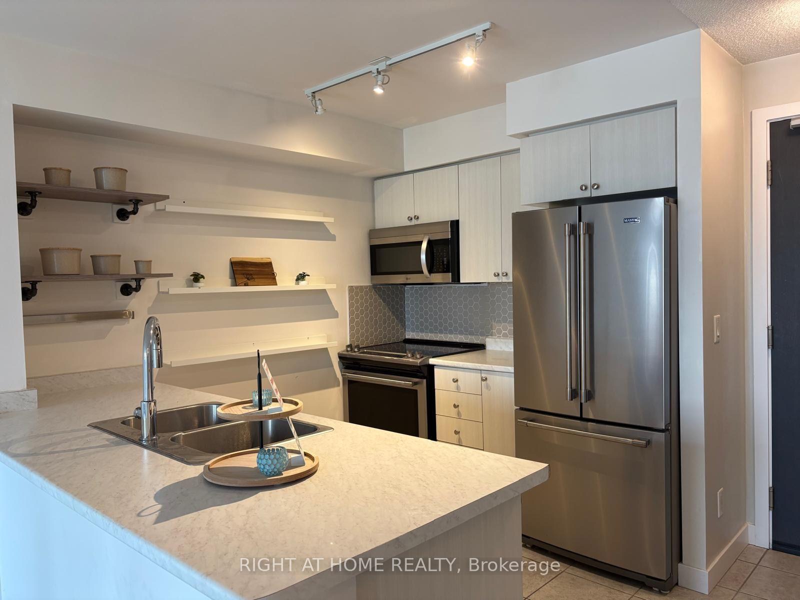 Photo 6 of Unit 302, 8 Trent Avenue, Toronto, East End-Danforth — HOMEH