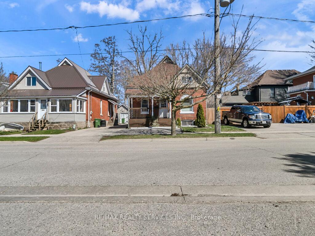 Photo 2 of 65 Moore Street, St. Thomas — HOMEH