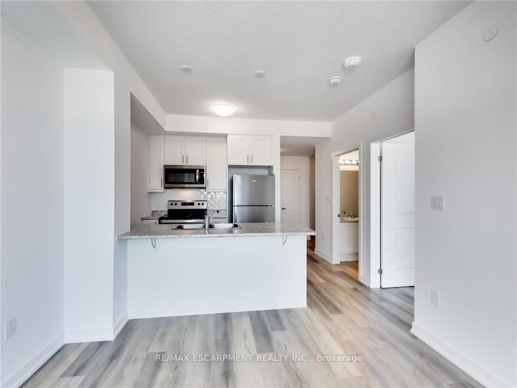 Photo 1 of Unit 1008, 470 Dundas Street E, Hamilton, Waterdown — HOMEH