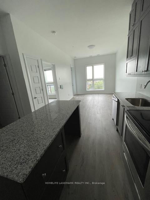 Photo 5 of Unit 411, 95 Dundas Street S, Oakville, Rural Oakville — HOMEH