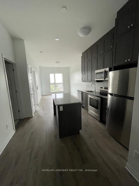 Photo 6 of Unit 411, 95 Dundas Street S, Oakville, Rural Oakville — HOMEH