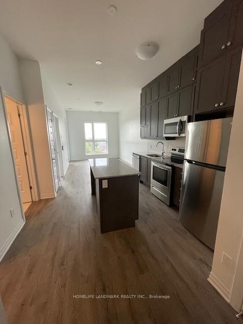 Photo 7 of Unit 411, 95 Dundas Street S, Oakville, Rural Oakville — HOMEH