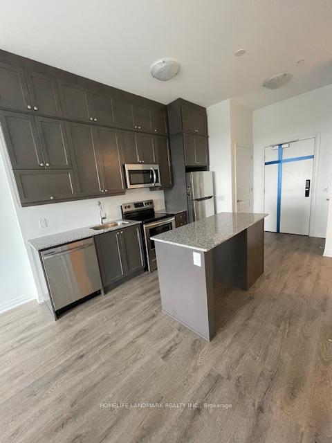 Photo 11 of Unit 411, 95 Dundas Street S, Oakville, Rural Oakville — HOMEH