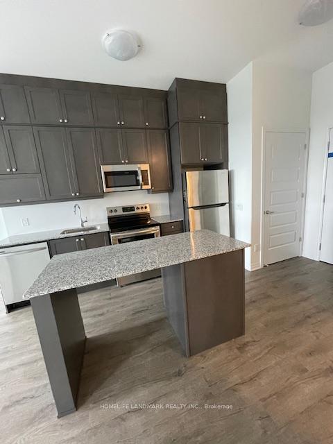 Photo 13 of Unit 411, 95 Dundas Street S, Oakville, Rural Oakville — HOMEH