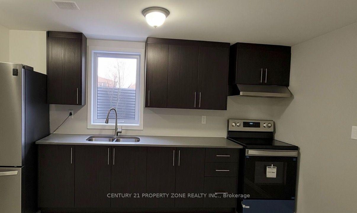 Photo 2 of Unit BASEMENT A, 79 Windmill Boulevard, Brampton, Fletcher's Creek South — HOMEH
