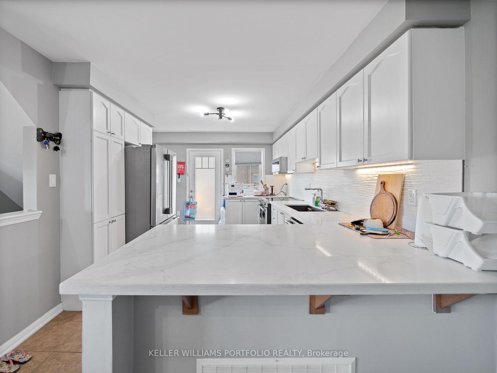 Photo 17 of Unit 1, 1025 Nadalin Heights, Milton, Willmott — HOMEH