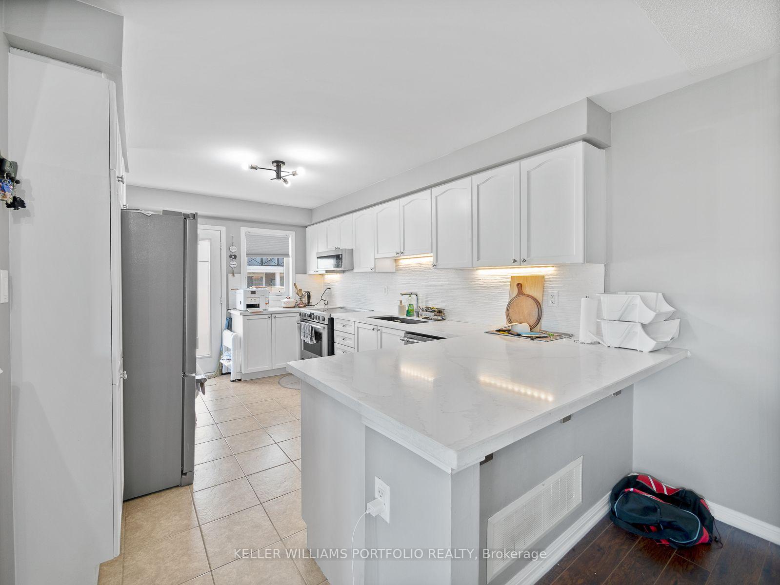 Photo 19 of Unit 1, 1025 Nadalin Heights, Milton, Willmott — HOMEH