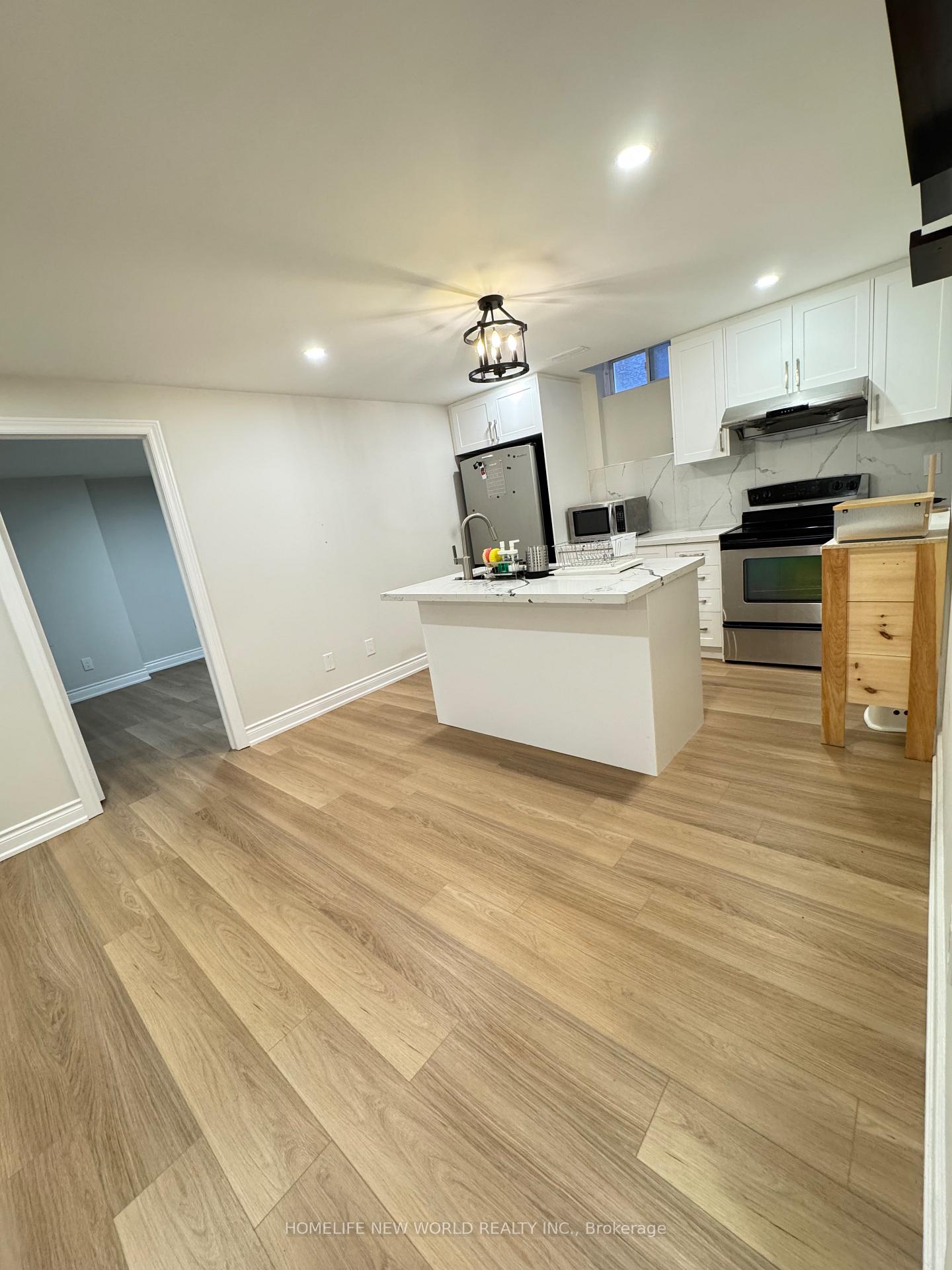 Photo 2 of Unit Bsmt 2, 90 Riverwalk Drive, Markham, Box Grove — HOMEH