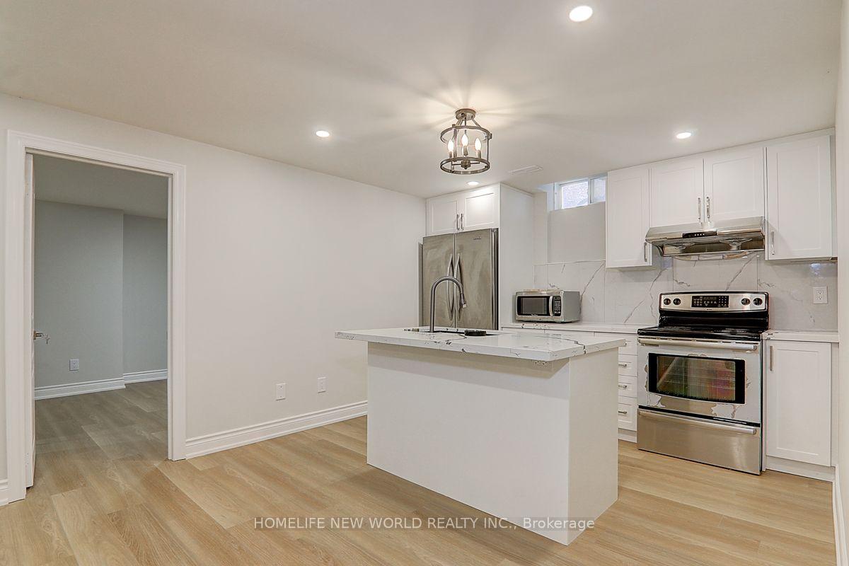 Photo 3 of Unit Bsmt 2, 90 Riverwalk Drive, Markham, Box Grove — HOMEH