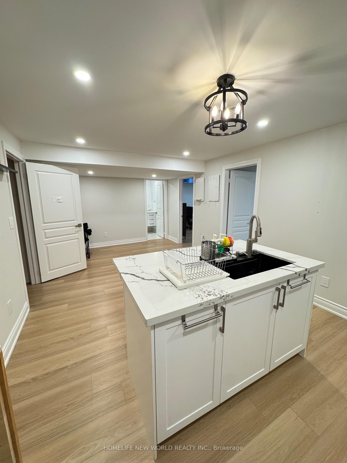 Photo 7 of Unit Bsmt 2, 90 Riverwalk Drive, Markham, Box Grove — HOMEH