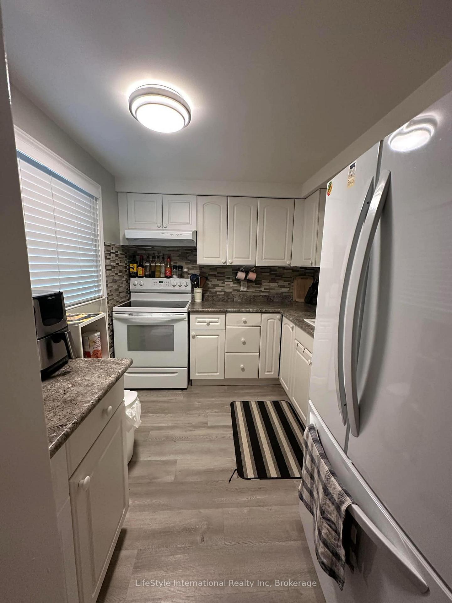 Photo 3 of Unit 4, 5982 Dunn Street, Niagara Falls, Arad/Fallsview — HOMEH