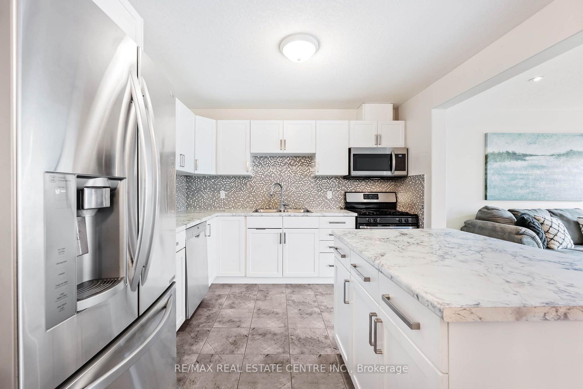 Photo 9 of 19 Laverty Crescent, Orangeville — HOMEH