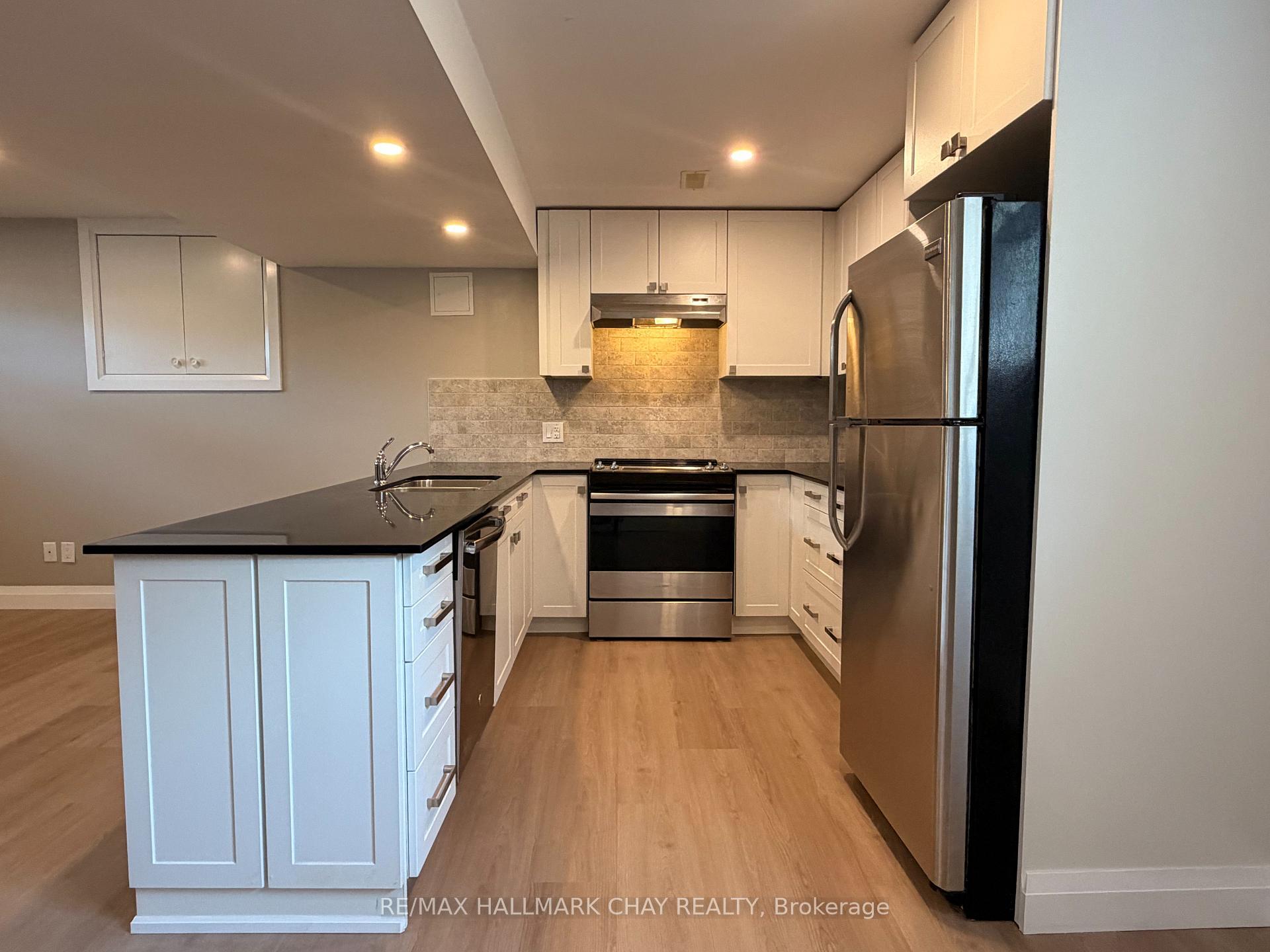 Photo 6 of Unit 2, 64 Newton Street, Barrie, Wellington — HOMEH