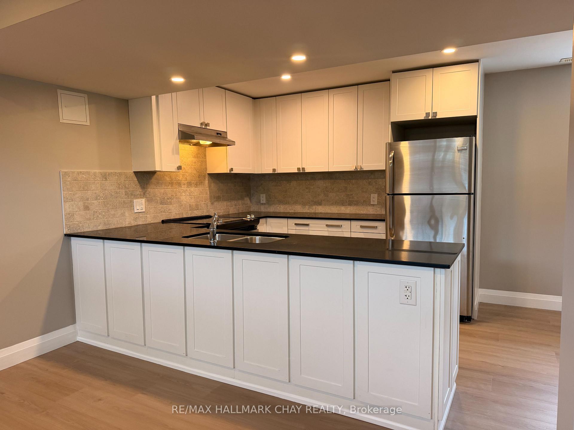 Photo 7 of Unit 2, 64 Newton Street, Barrie, Wellington — HOMEH