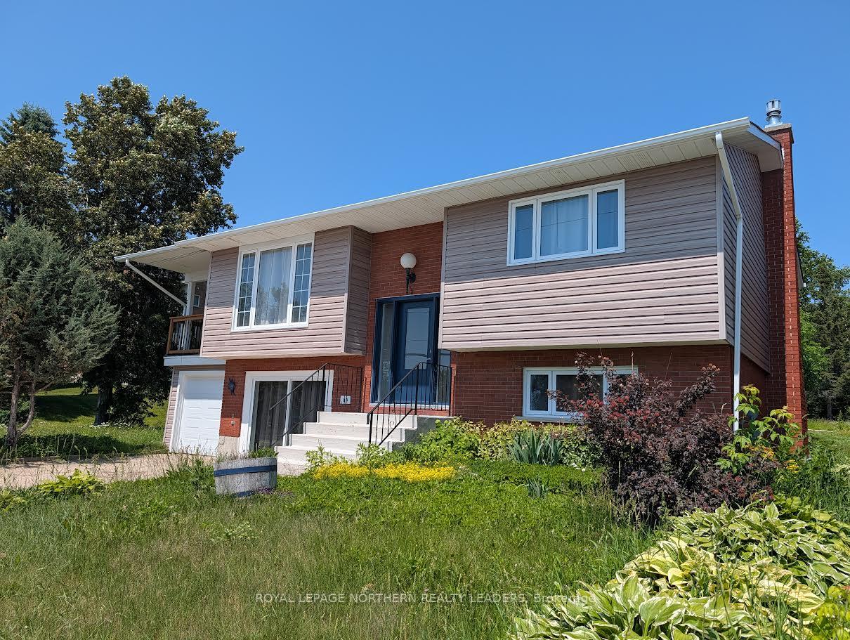 Photo 3 of 84 Brousseau Avenue, Timmins, TNE - North — HOMEH