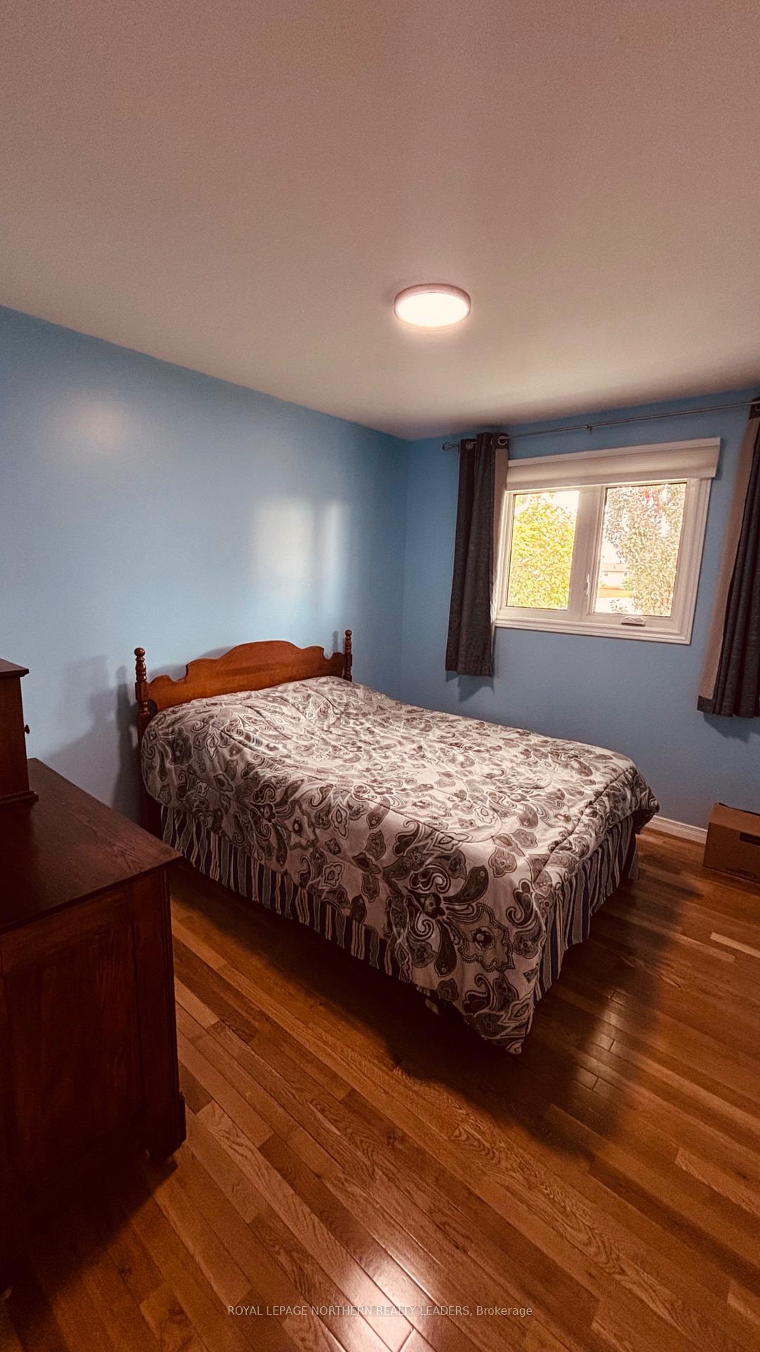 Photo 25 of 65 Connaught Avenue S, Cochrane — HOMEH