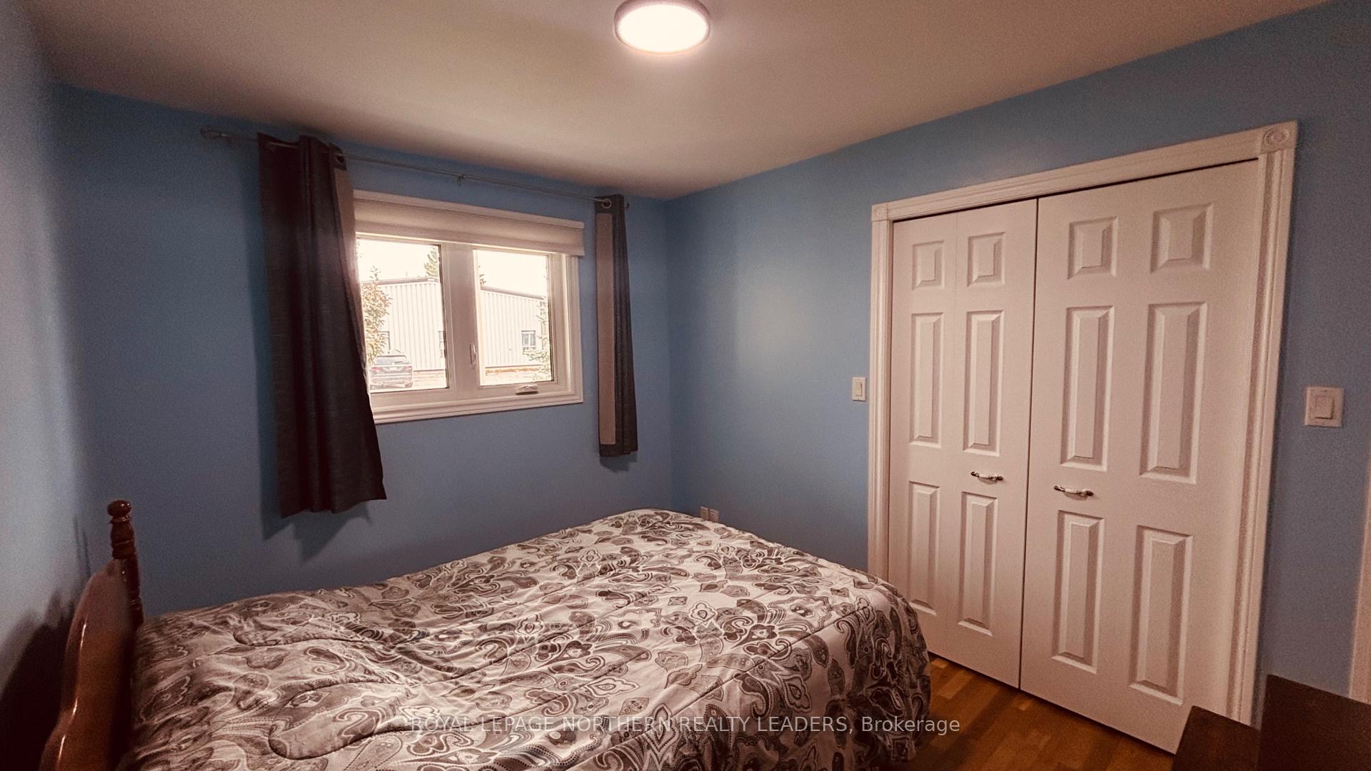 Photo 26 of 65 Connaught Avenue S, Cochrane — HOMEH
