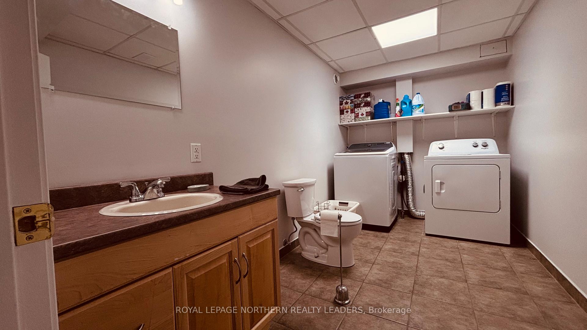 Photo 36 of 65 Connaught Avenue S, Cochrane — HOMEH