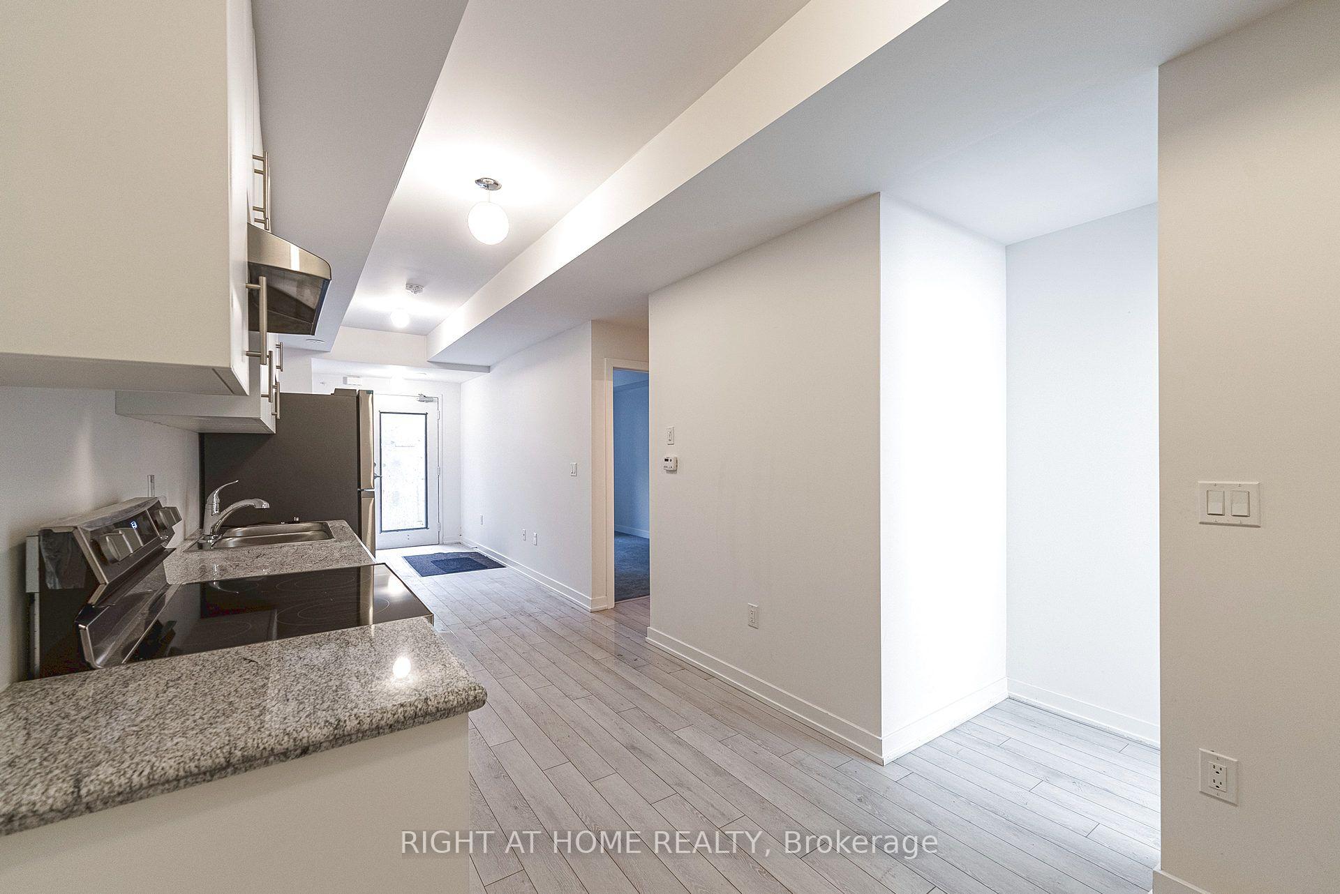 Photo 8 of Unit 102, 15100 Yonge Street, Aurora, Aurora Village — HOMEH