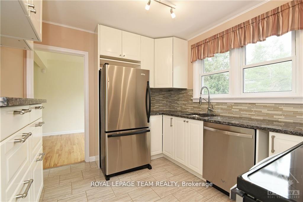 Photo 11 of 822 Quinlan Road, Ottawa, Elmvale Acres — HOMEH