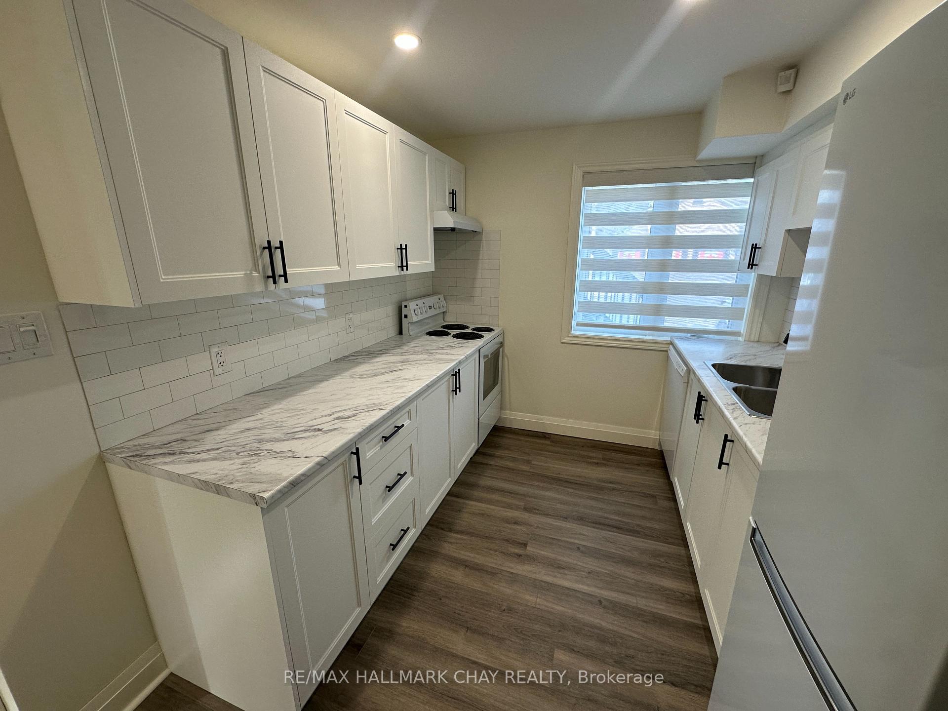 Photo 5 of 64 Logan Court, Barrie, Holly — HOMEH