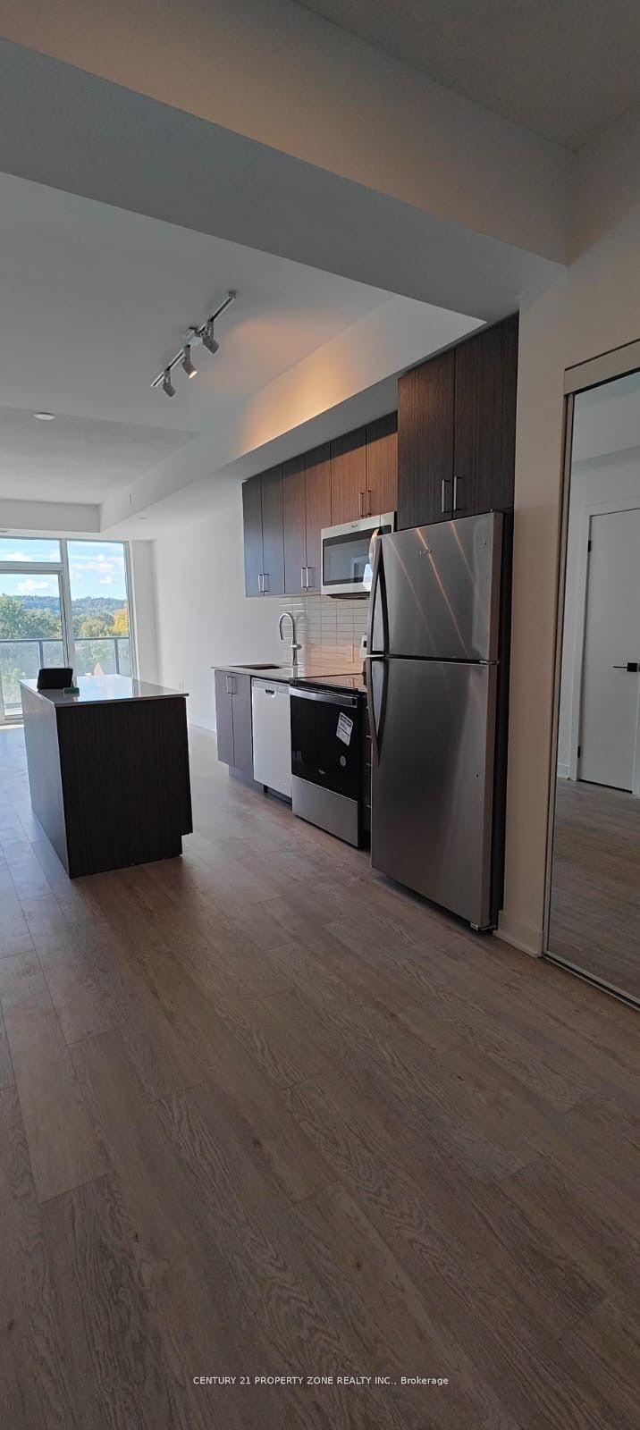 Photo 3 of Unit 405, 2782 Barton Street E, Hamilton, Riverdale — HOMEH