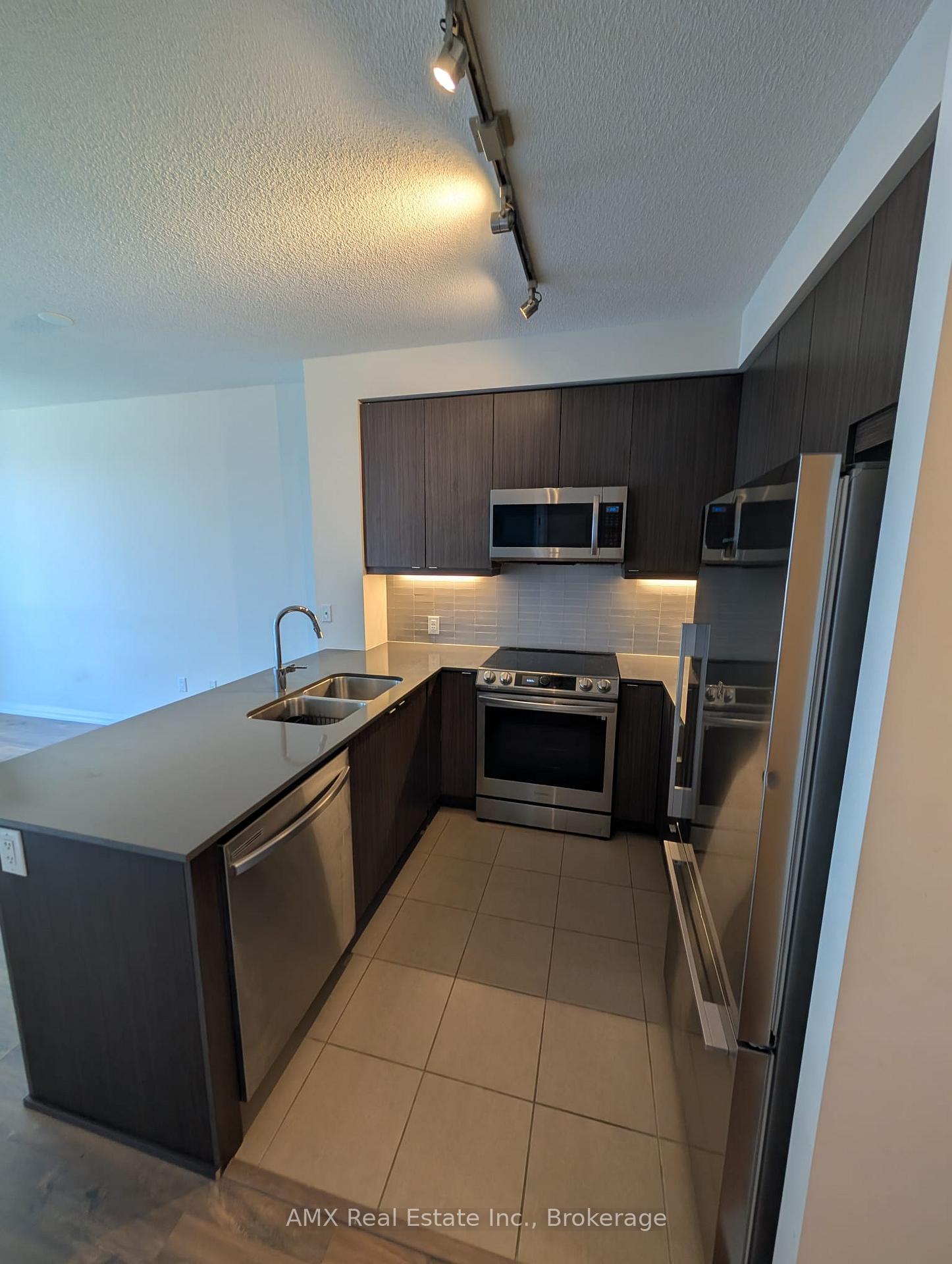 Photo 6 of Unit 1001, 50 Thomas Riley Road, Etobicoke, Islington-City Centre West — HOMEH