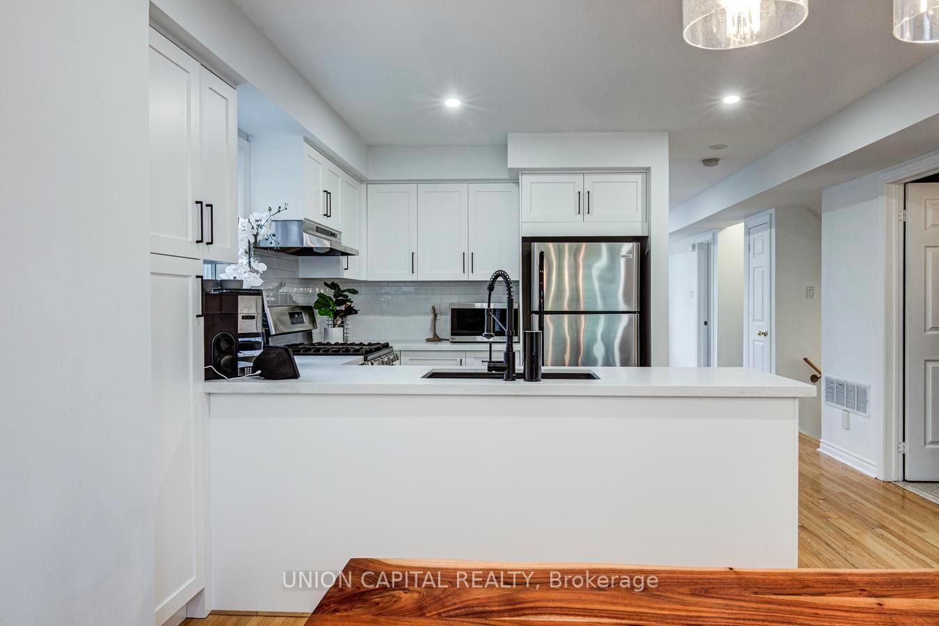 Photo 15 of Unit 8, 1 Bastedo Avenue, Toronto, Woodbine Corridor — HOMEH