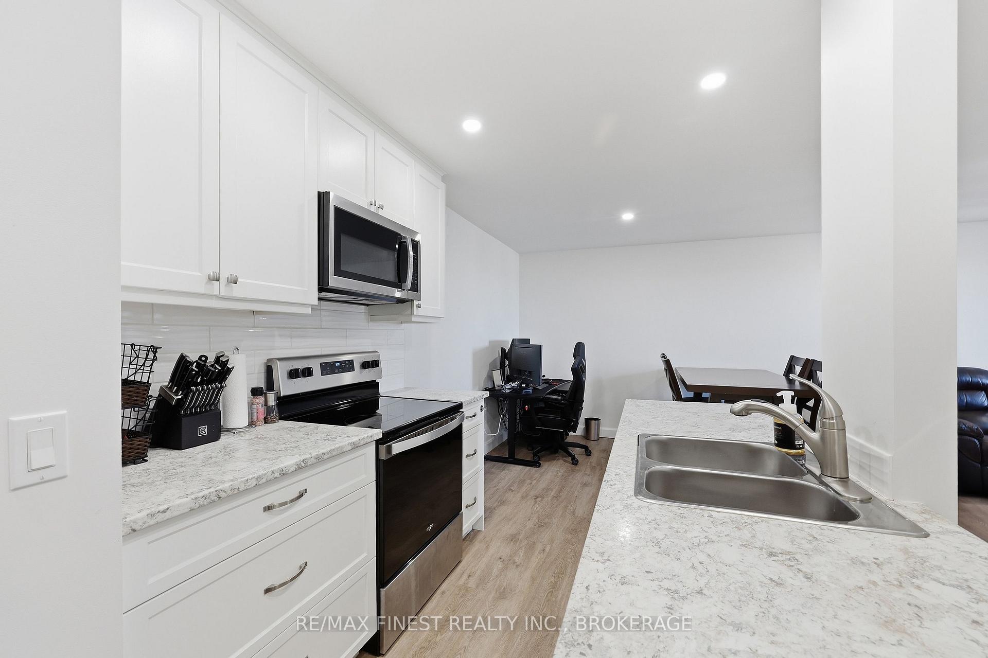 Photo 16 of Unit 408, 334 Queen Mary Road, Kingston, West of Sir John A. Blvd — HOMEH