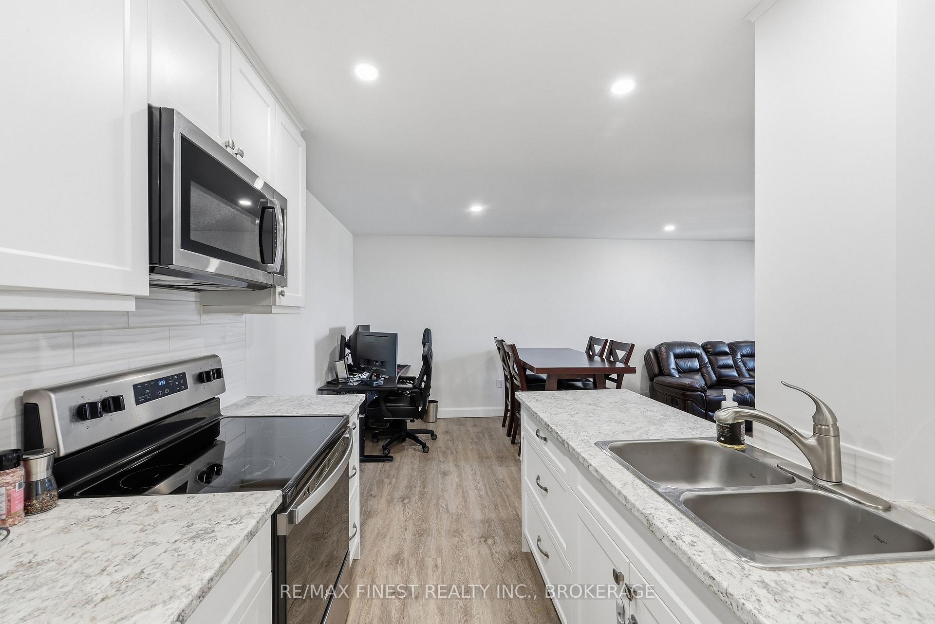 Photo 17 of Unit 408, 334 Queen Mary Road, Kingston, West of Sir John A. Blvd — HOMEH