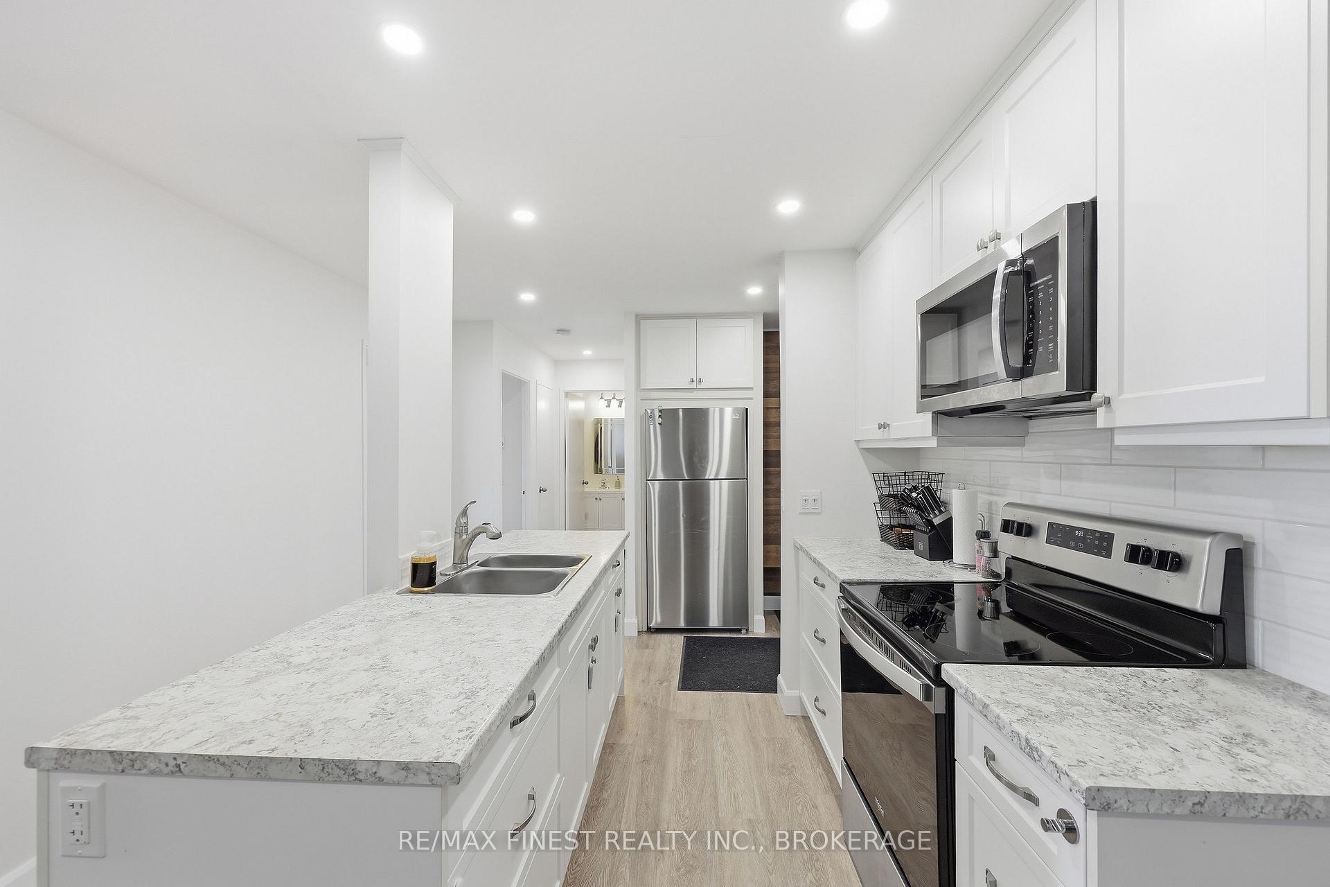 Photo 18 of Unit 408, 334 Queen Mary Road, Kingston, West of Sir John A. Blvd — HOMEH