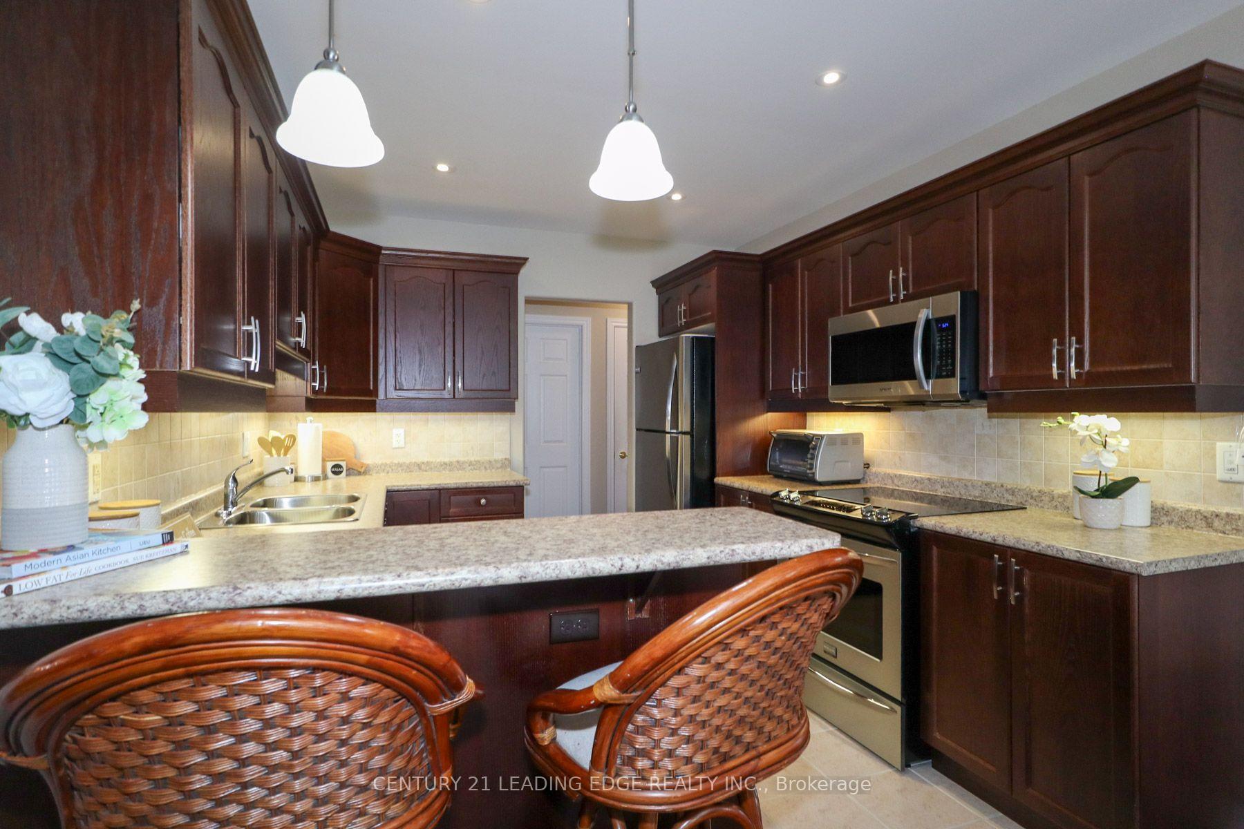 Photo 4 of Unit 100, 61 Village Crescent, Peterborough, Otonabee Ward 1 — HOMEH