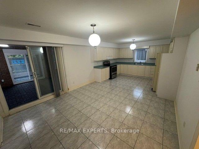 Photo 6 of 273 Gary Drive, North York, Humberlea-Pelmo Park — HOMEH