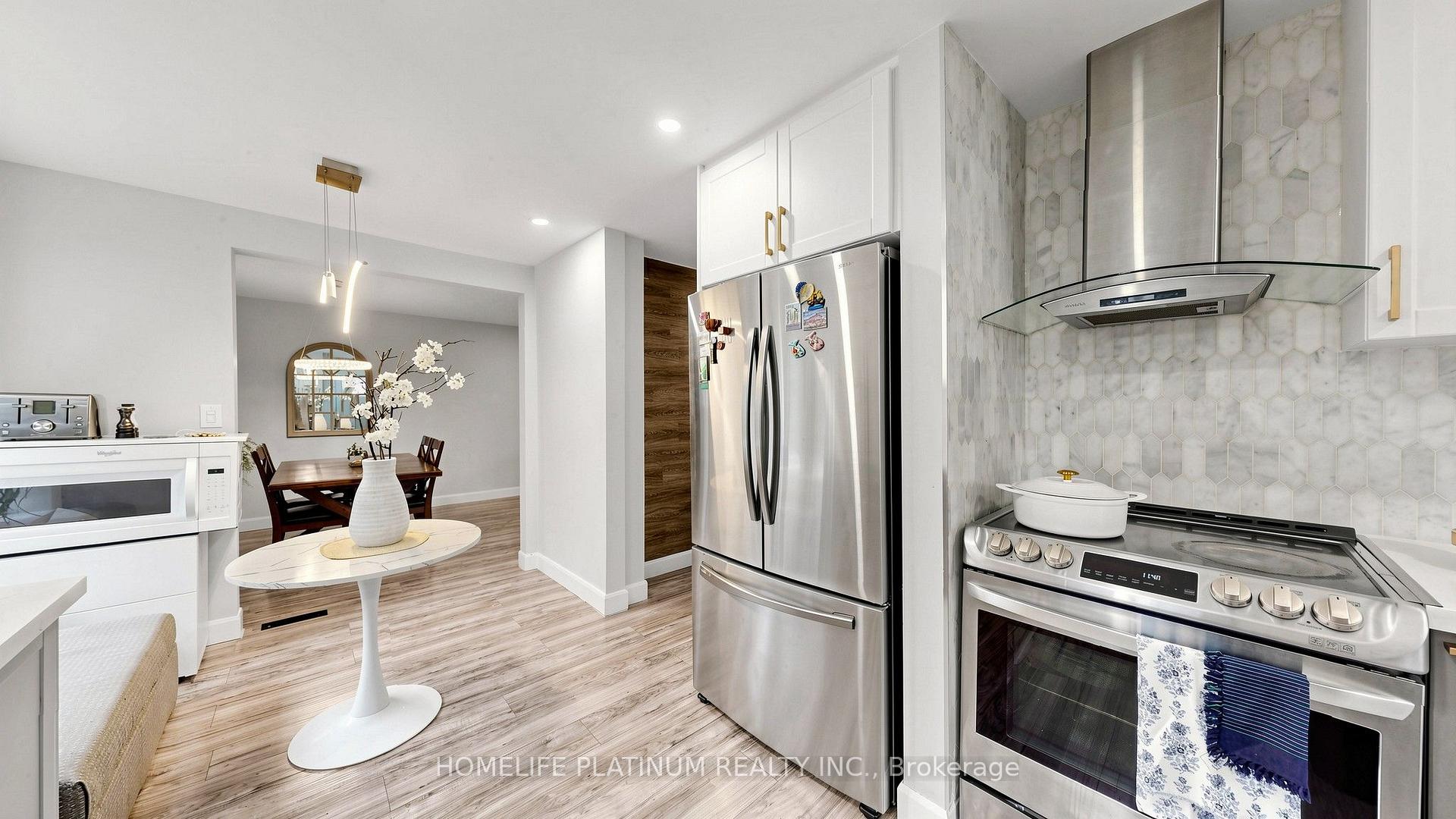 Photo 19 of 206 Mcmurchy Avenue S, Brampton, Brampton South — HOMEH