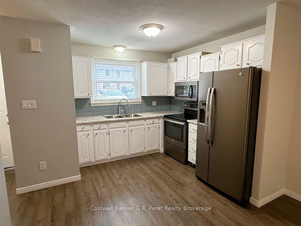 Photo 6 of Unit 3, 150 Concession Street E, Tillsonburg — HOMEH
