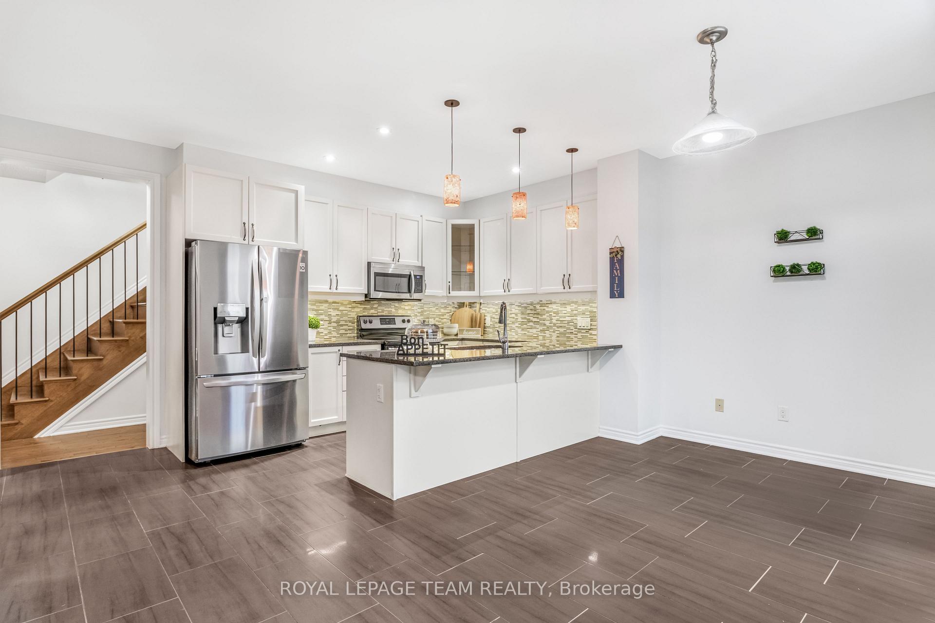 Photo 13 of 57 Crownridge Drive, Ottawa, Kanata - Emerald Meadows/Trailwest — HOMEH