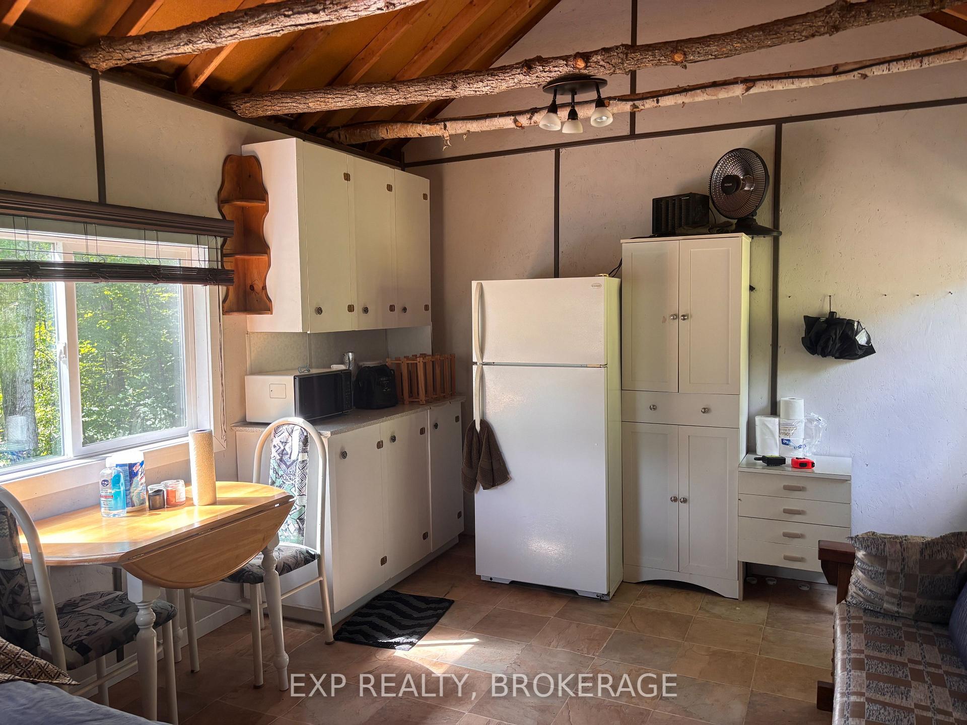 Photo 11 of 1097 Big Bay Drive E, Frontenac, Frontenac Centre — HOMEH