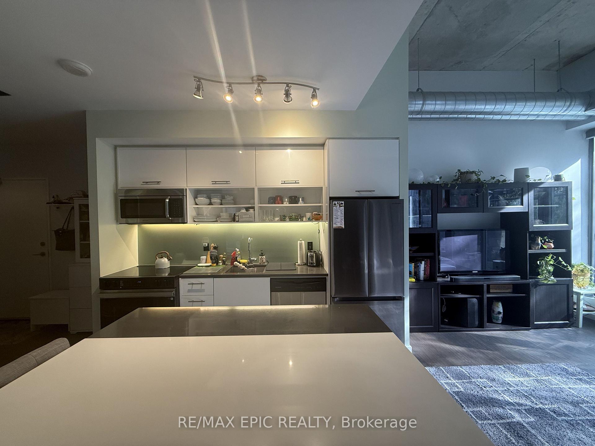 Photo 3 of Unit 305, 32 Trolley Crescent, Toronto, Moss Park — HOMEH