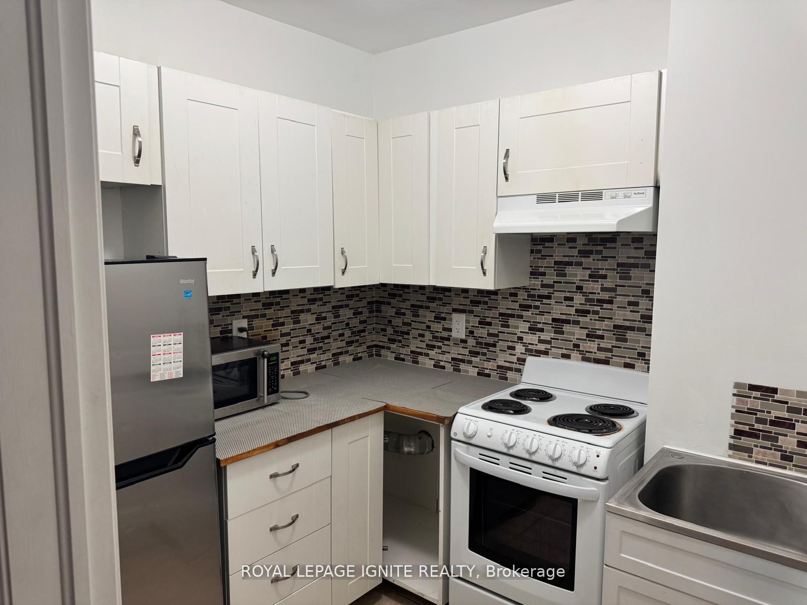 Photo 12 of 1309 Danforth Road, Scarborough, Eglinton East — HOMEH