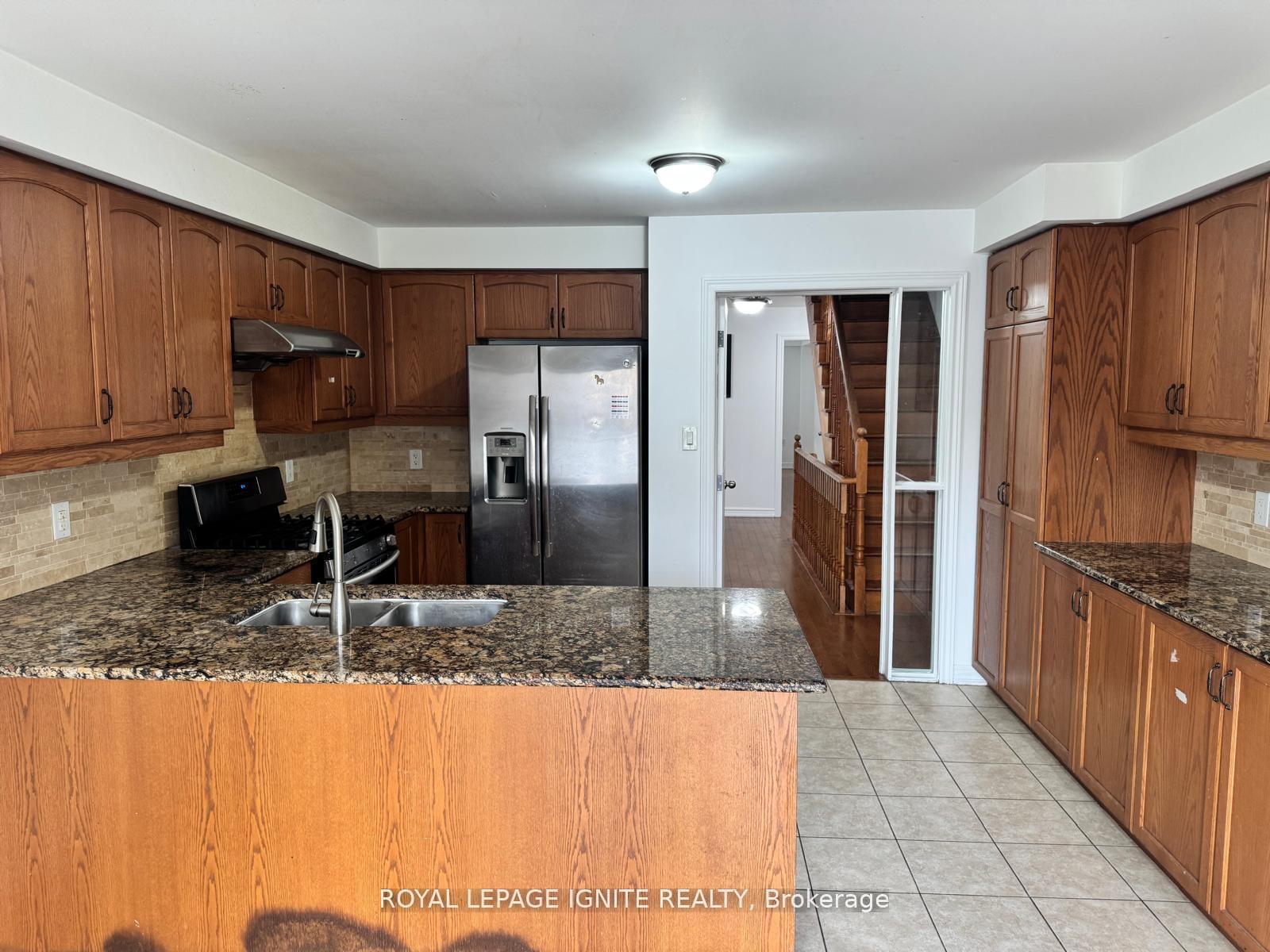 Photo 13 of 1309 Danforth Road, Scarborough, Eglinton East — HOMEH