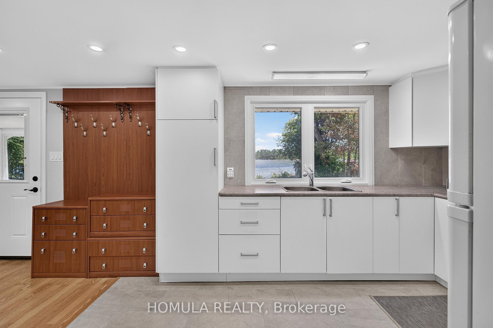 Photo 17 of 24 Riverside Drive, Kawartha Lakes, Ops — HOMEH