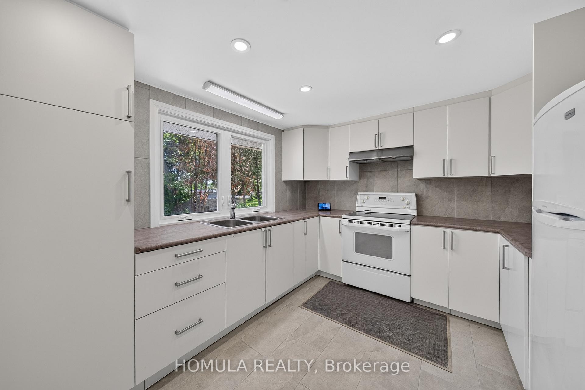 Photo 20 of 24 Riverside Drive, Kawartha Lakes, Ops — HOMEH
