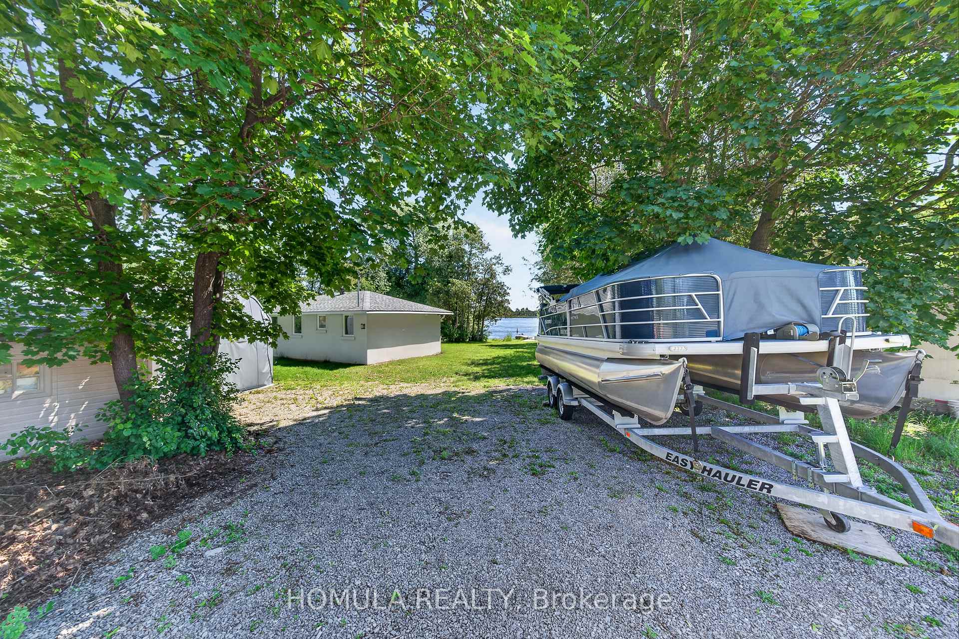 Photo 35 of 24 Riverside Drive, Kawartha Lakes, Ops — HOMEH